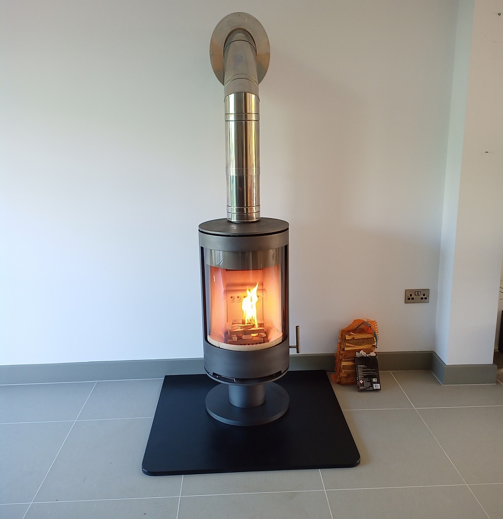 Modern wood-burner fitted to metal chimney system